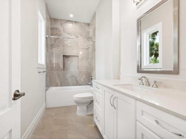 bathroom with shower / bathing tub combination, baseboards, toilet, and vanity