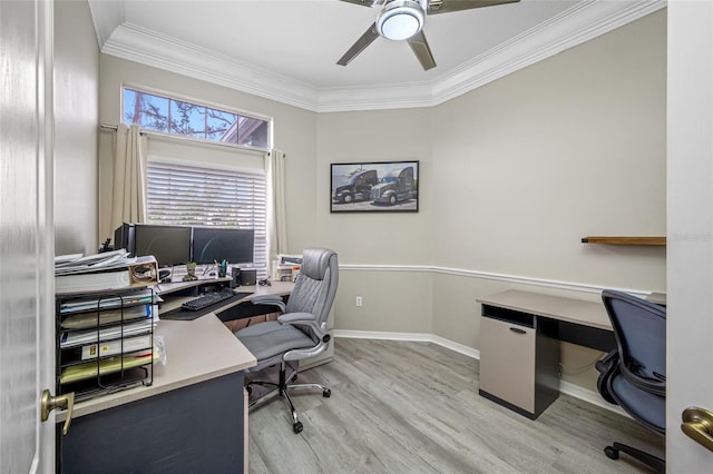 home office with baseboards, wood finished floors, a ceiling fan, and ornamental molding