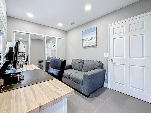 office area featuring visible vents and recessed lighting