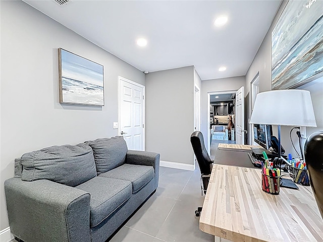 home office with baseboards and recessed lighting