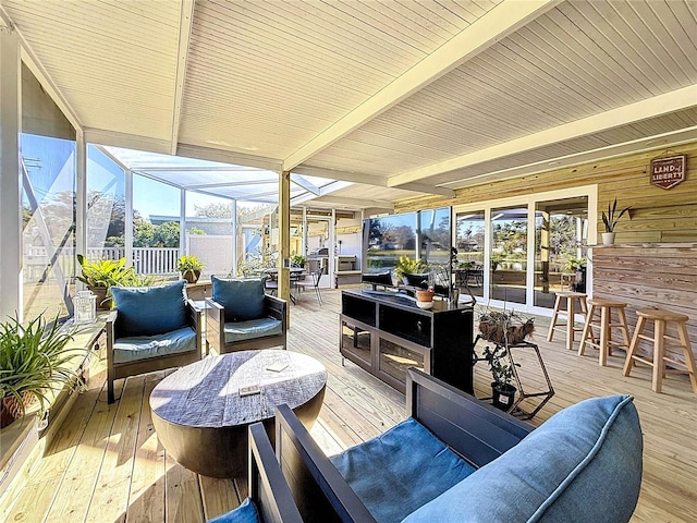 sunroom / solarium with beam ceiling