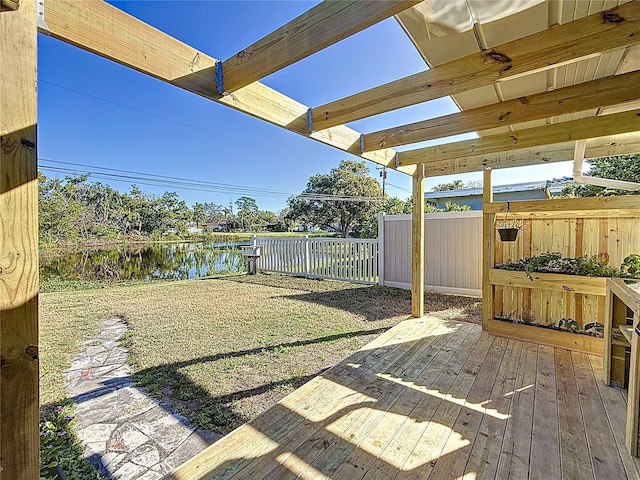 view of yard featuring fence and a deck