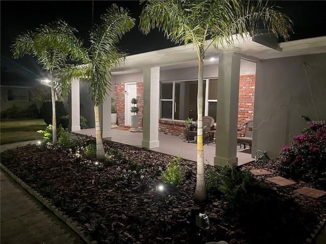 view of patio at twilight