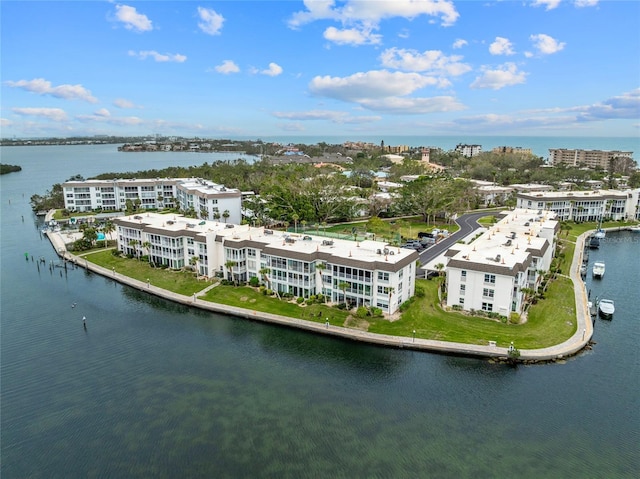 birds eye view of property featuring a water view