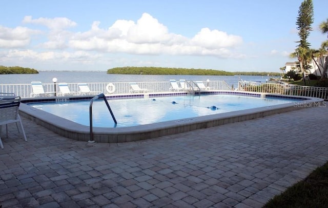 4310 Falmouth Dr Unit 304, Longboat Key, FL 34228 - community pool featuring a water view and a patio area