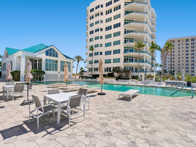 pool with a patio area