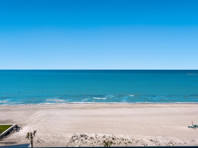 property view of water featuring a beach view