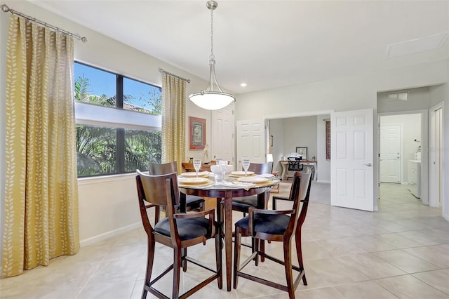 dining room with recessed lighting, light tile patterned flooring, and baseboards