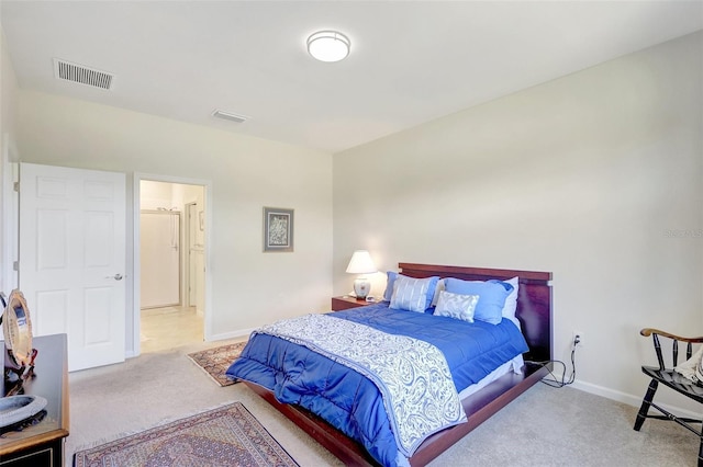 bedroom with baseboards, visible vents, and carpet flooring