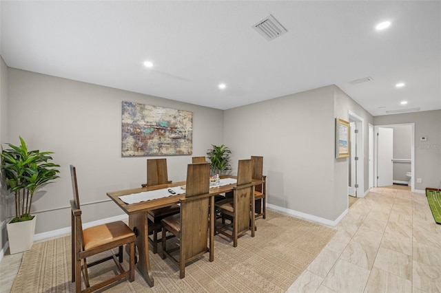 dining area featuring recessed lighting, visible vents, baseboards, and marble finish floor