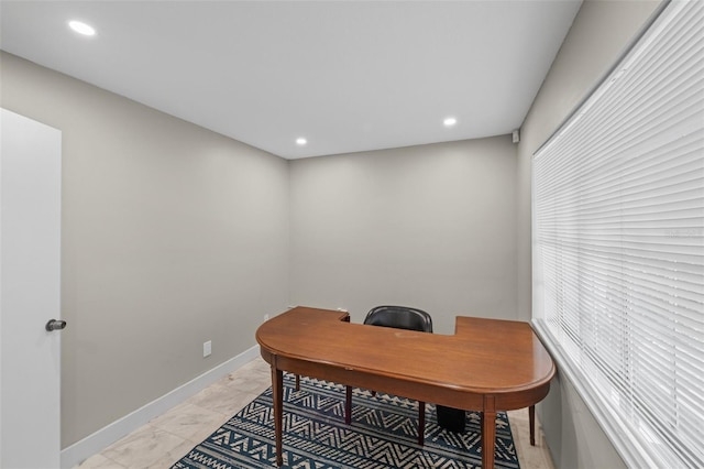 office with recessed lighting, baseboards, and marble finish floor