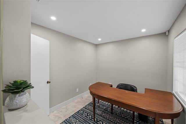 office area featuring recessed lighting, baseboards, and marble finish floor