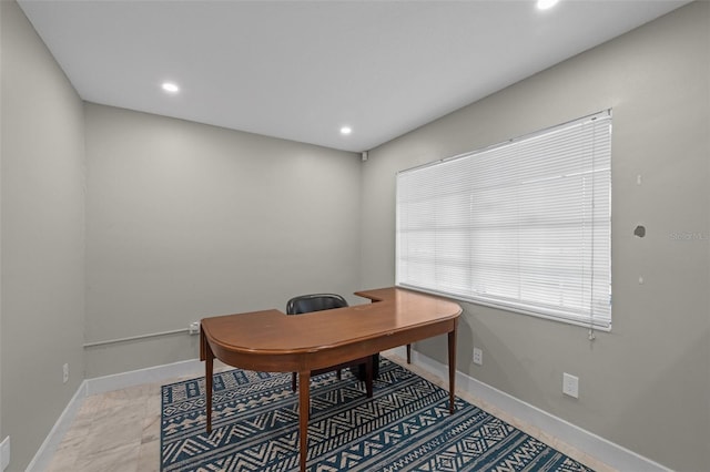 office space featuring recessed lighting and baseboards