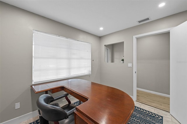 office space with visible vents, recessed lighting, and baseboards