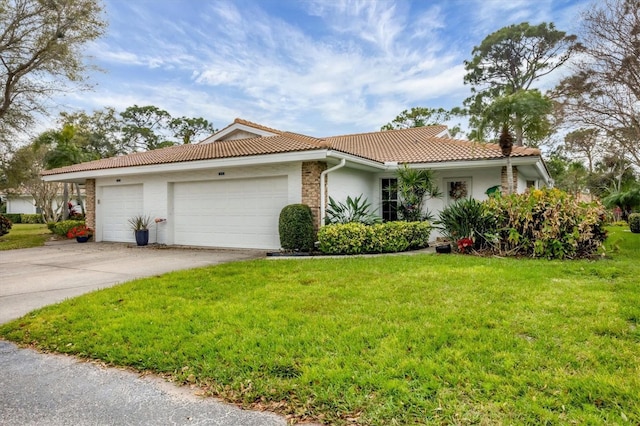 5614 Garden Lakes Dr, Bradenton, FL 34203 - view of front facade with stucco siding, a garage, driveway, a tiled roof, and a front lawn