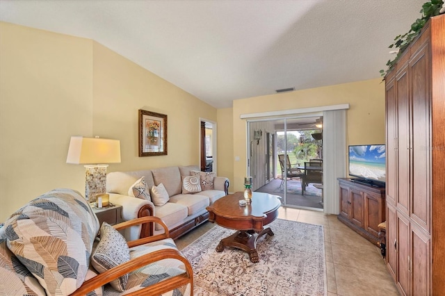 5614 Garden Lakes Dr, Bradenton, FL 34203 - living room featuring visible vents and light tile patterned flooring