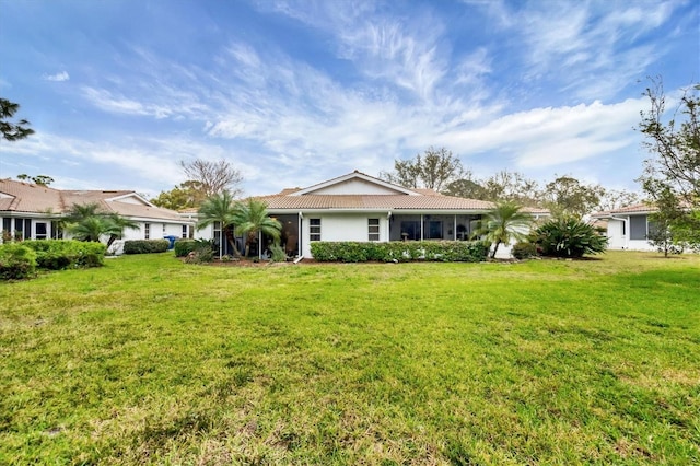 5614 Garden Lakes Dr, Bradenton, FL 34203 - view of front of home featuring a tiled roof and a front yard