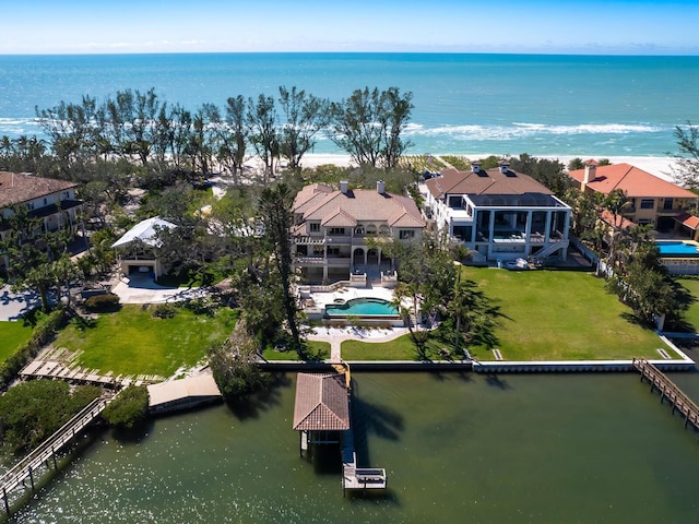 aerial view featuring a water view and a residential view