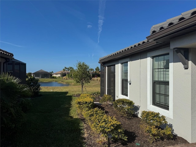 view of yard featuring a water view