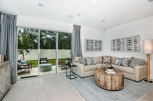 living area featuring light tile patterned flooring