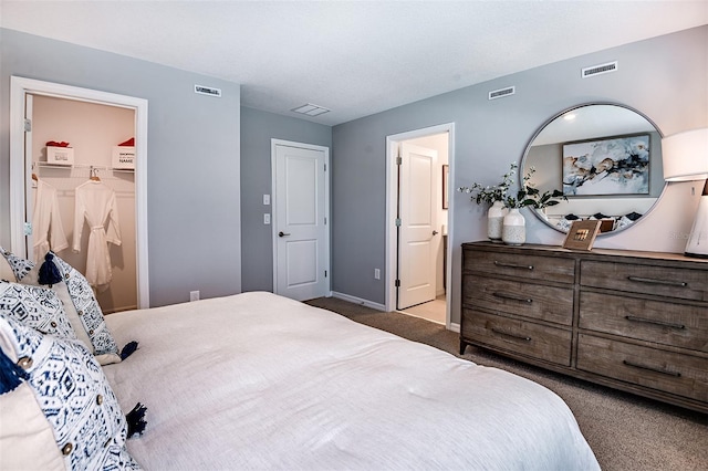 bedroom featuring carpet floors and visible vents