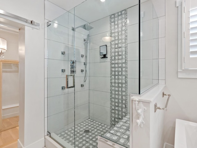 bathroom with a shower stall