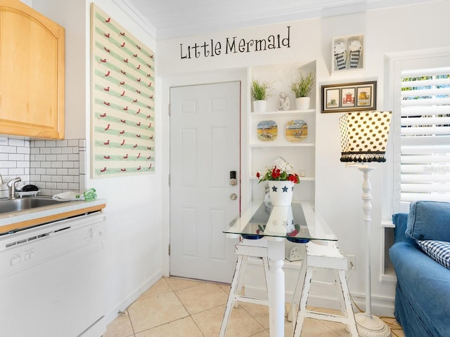 interior space with light tile patterned flooring and crown molding