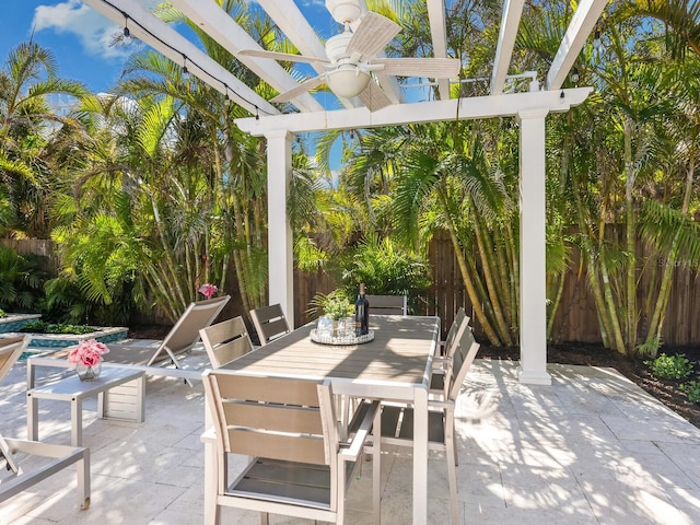 view of patio / terrace featuring a fenced in pool, fence, outdoor dining area, and a pergola