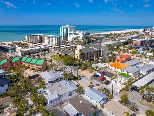 birds eye view of property featuring a view of city and a water view