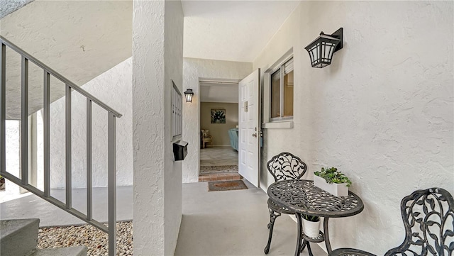 1711 Southwood St Unit 1711, Sarasota, FL 34231 - view of exterior entry featuring stucco siding