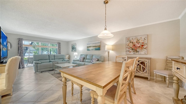1711 Southwood St Unit 1711, Sarasota, FL 34231 - dining space featuring light tile patterned floors, ornamental molding, and a textured ceiling
