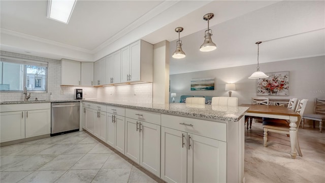 1711 Southwood St Unit 1711, Sarasota, FL 34231 - kitchen with stainless steel dishwasher, ornamental molding, a peninsula, a sink, and backsplash