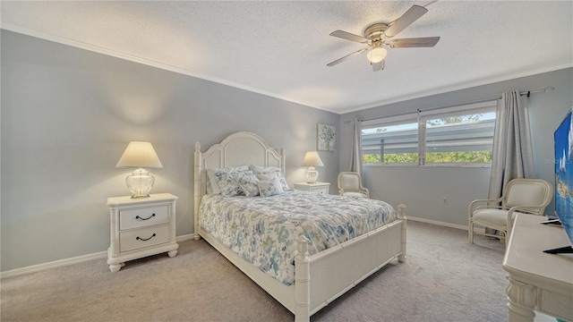 1711 Southwood St Unit 1711, Sarasota, FL 34231 - bedroom featuring crown molding, baseboards, a textured ceiling, and light colored carpet