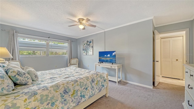 1711 Southwood St Unit 1711, Sarasota, FL 34231 - carpeted bedroom with crown molding, a ceiling fan, a textured ceiling, and baseboards