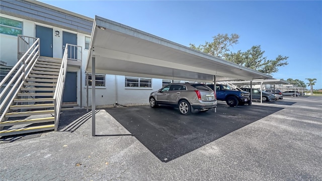 1711 Southwood St Unit 1711, Sarasota, FL 34231 - covered parking lot with stairway