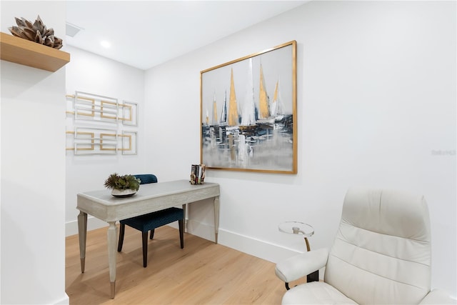 home office with recessed lighting, baseboards, and wood finished floors