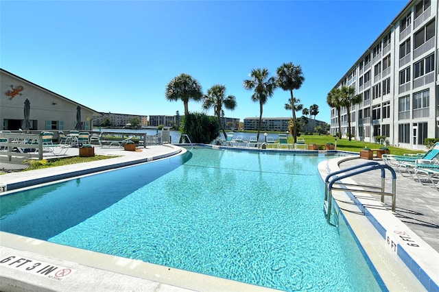 community pool with a patio