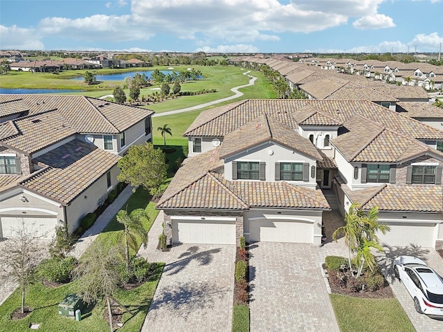 aerial view with a water view and a residential view