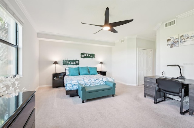 bedroom featuring carpet, visible vents, ornamental molding, a ceiling fan, and baseboards