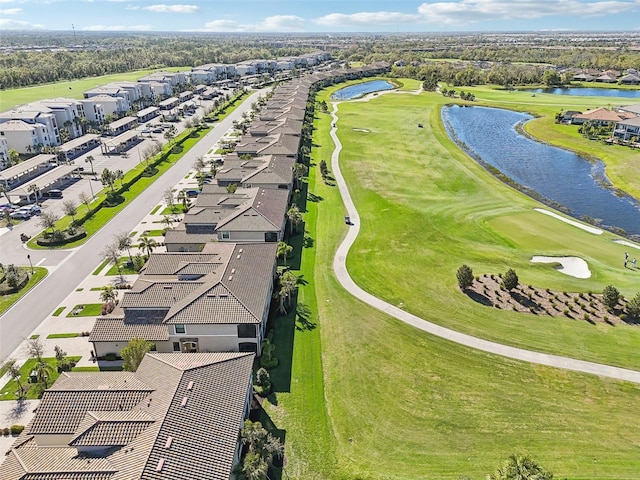 birds eye view of property with a residential view, view of golf course, and a water view