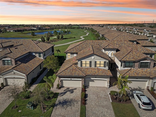 aerial view featuring a residential view and a water view