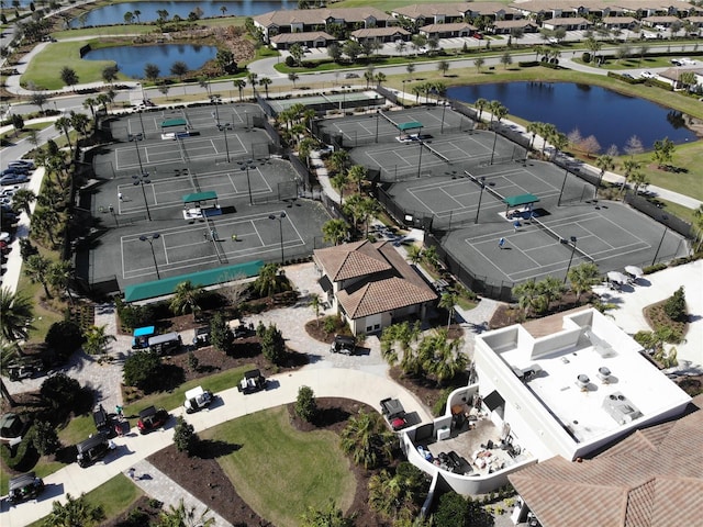 bird's eye view featuring a water view and a residential view