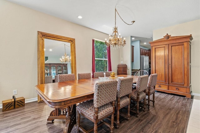 6156 41st St E, Bradenton, FL 34203 - dining room with a chandelier, wood finished floors, and recessed lighting