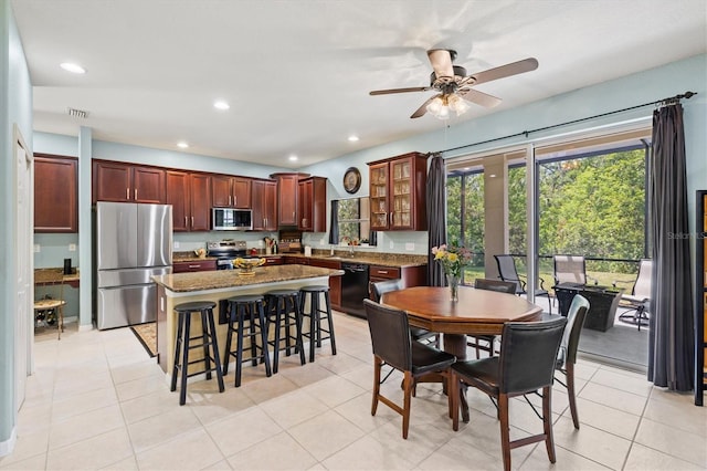 6156 41st St E, Bradenton, FL 34203 - dining room featuring ceiling fan, recessed lighting, and light tile patterned floors