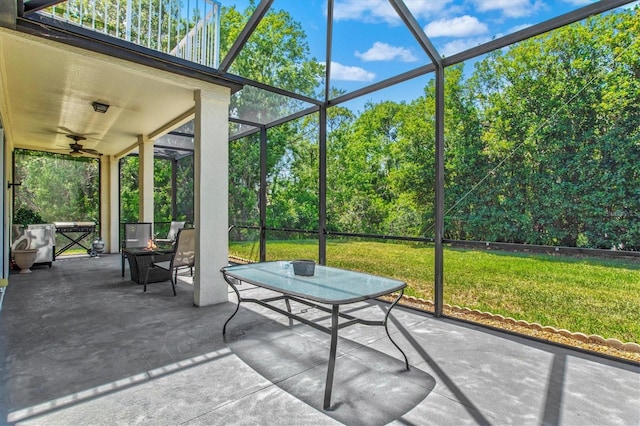6156 41st St E, Bradenton, FL 34203 - sunroom with ceiling fan and outdoor dining space