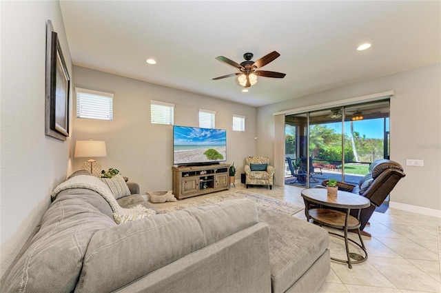 living room with recessed lighting, baseboards, ceiling fan, and light tile patterned flooring