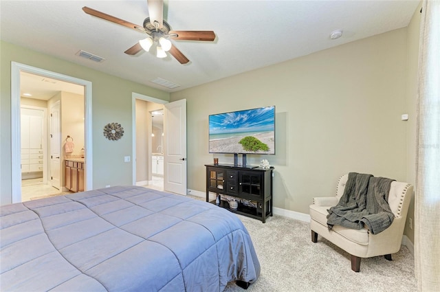 bedroom featuring carpet, connected bathroom, visible vents, and baseboards