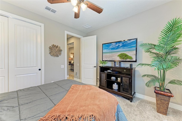 bedroom featuring a closet, visible vents, ceiling fan, and baseboards