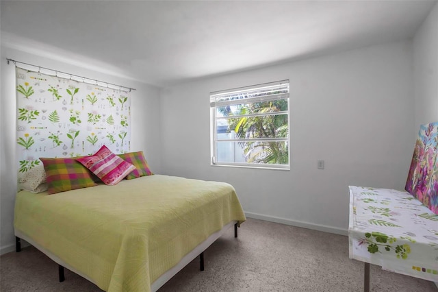 bedroom featuring baseboards