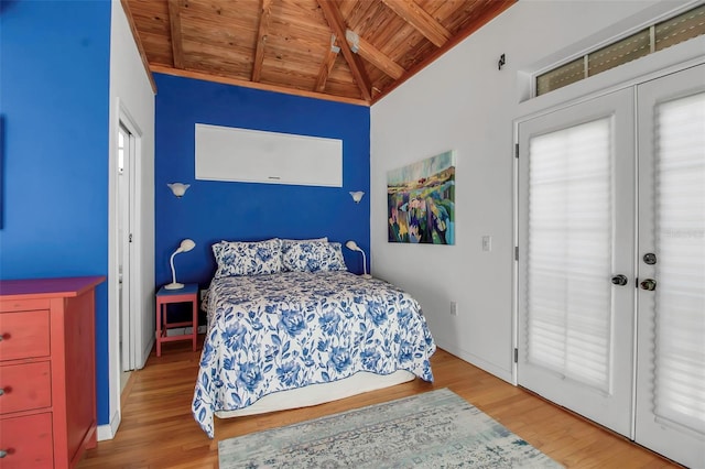 bedroom with lofted ceiling with beams, wooden ceiling, wood finished floors, and french doors